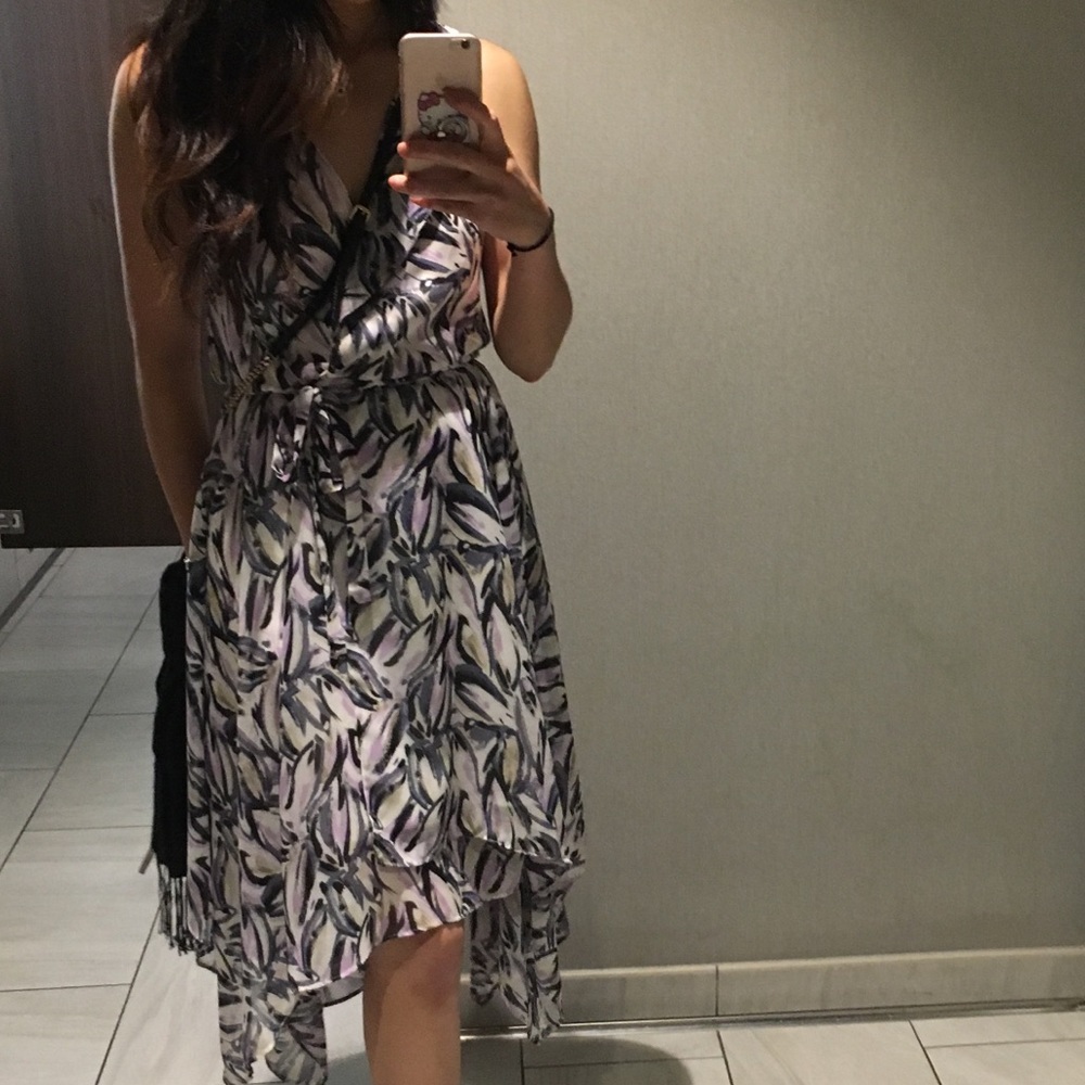 Beautiful sleeveless wrap dress worn once